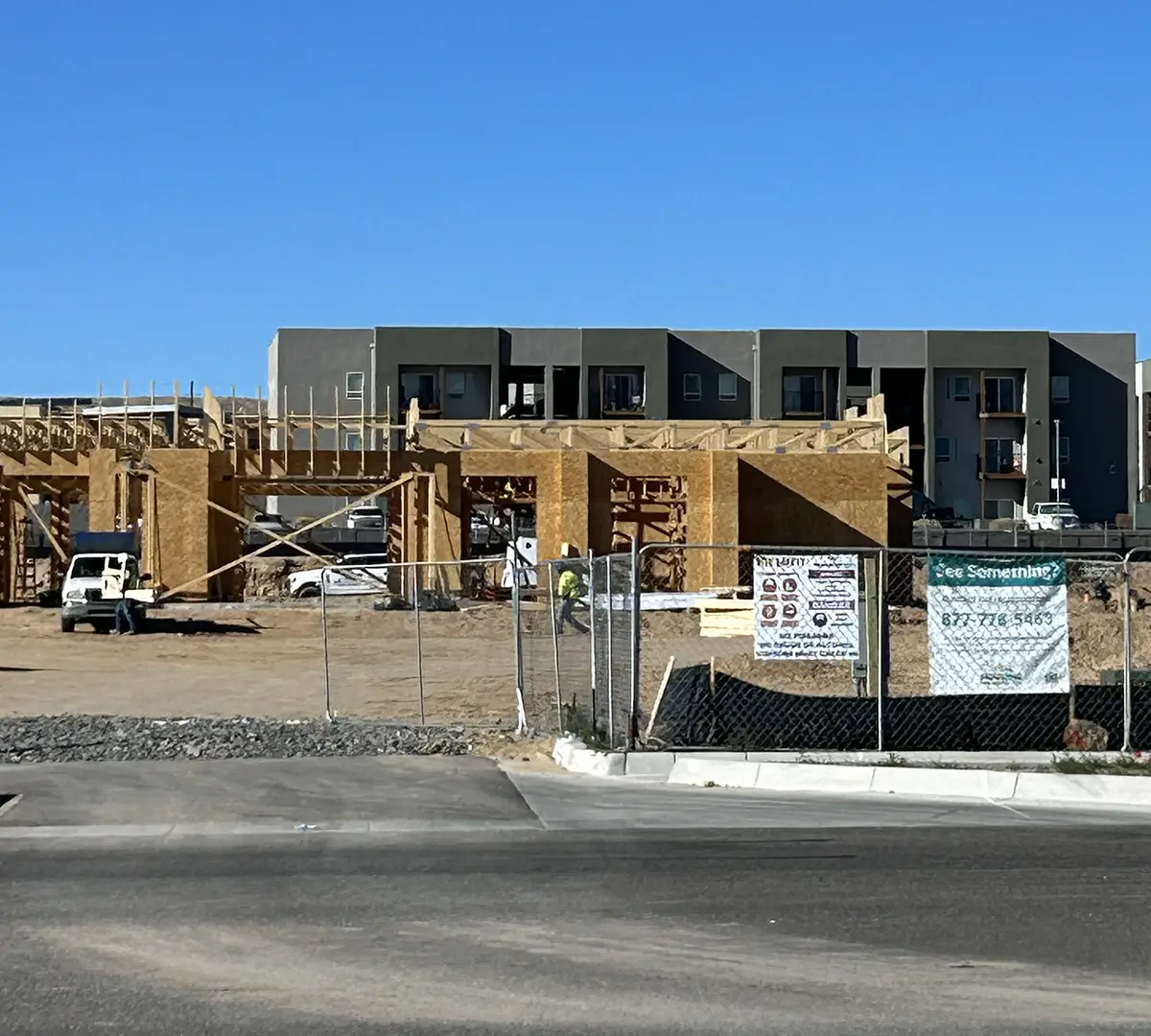Two buildings in the Tierra Linda complex, one in the early stages of construction and the other in a later stage.