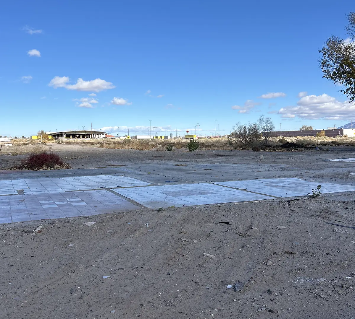 Panels of tile on gravel at the site of the future West Mesa Ridge A building.